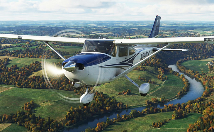 Cessna 182 airplane flying over the river